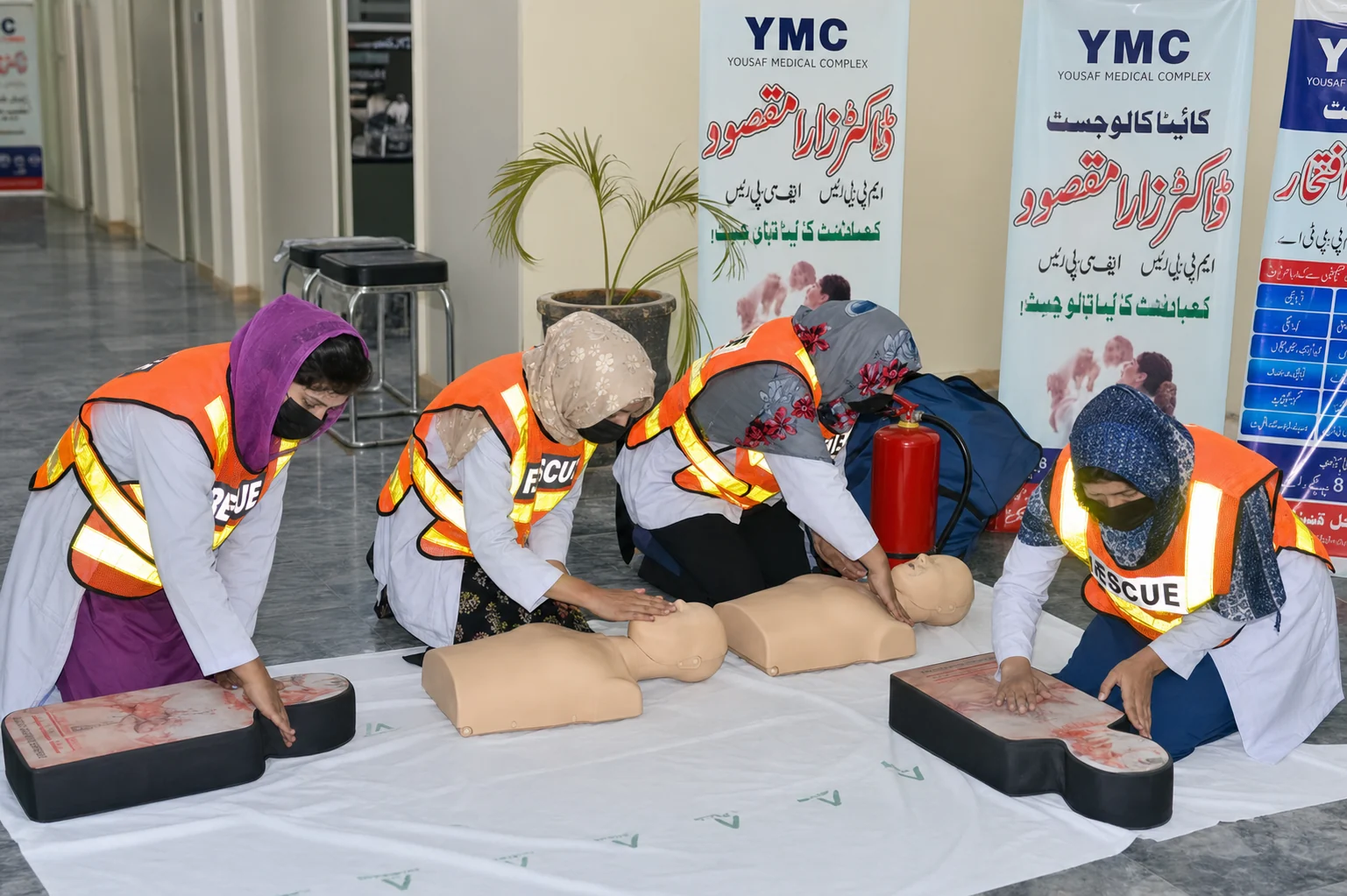 Clinical team participating in CPR training at Yousaf Medical Complex
