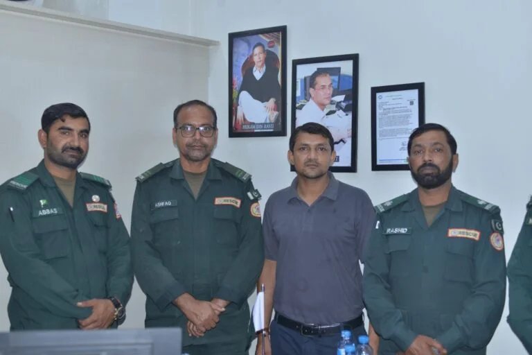 YMC colleagues with rescue professionals